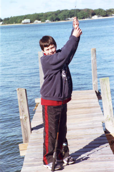 Jesse fishing at Scudder Cottages - closing weekend 2000